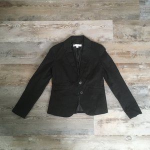 Black blazer with decorative pockets on front from New York & Company, size 2